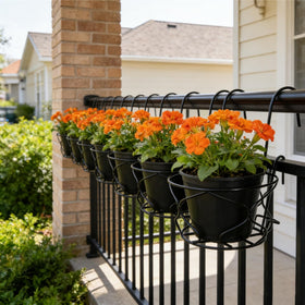 Noamus round-iron rack with black finish for secure fence mounting and outdoor display.