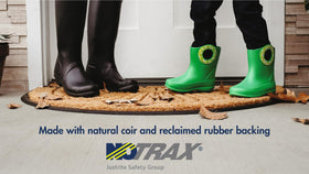 Notrax front door mat enhances entrance appeal with a rustic-modern vibe.