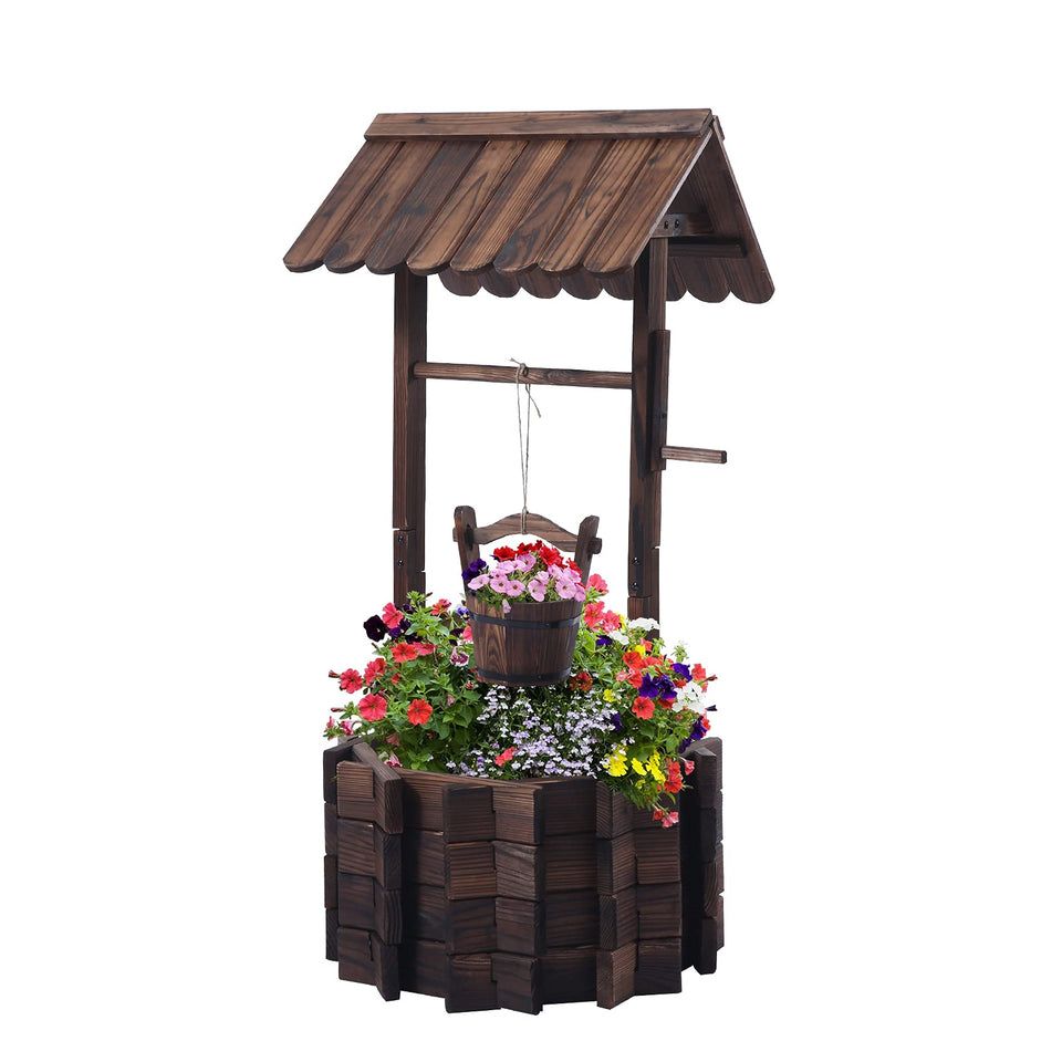 Notume garden wooden wishing well planter in outdoor space adds rustic charm.