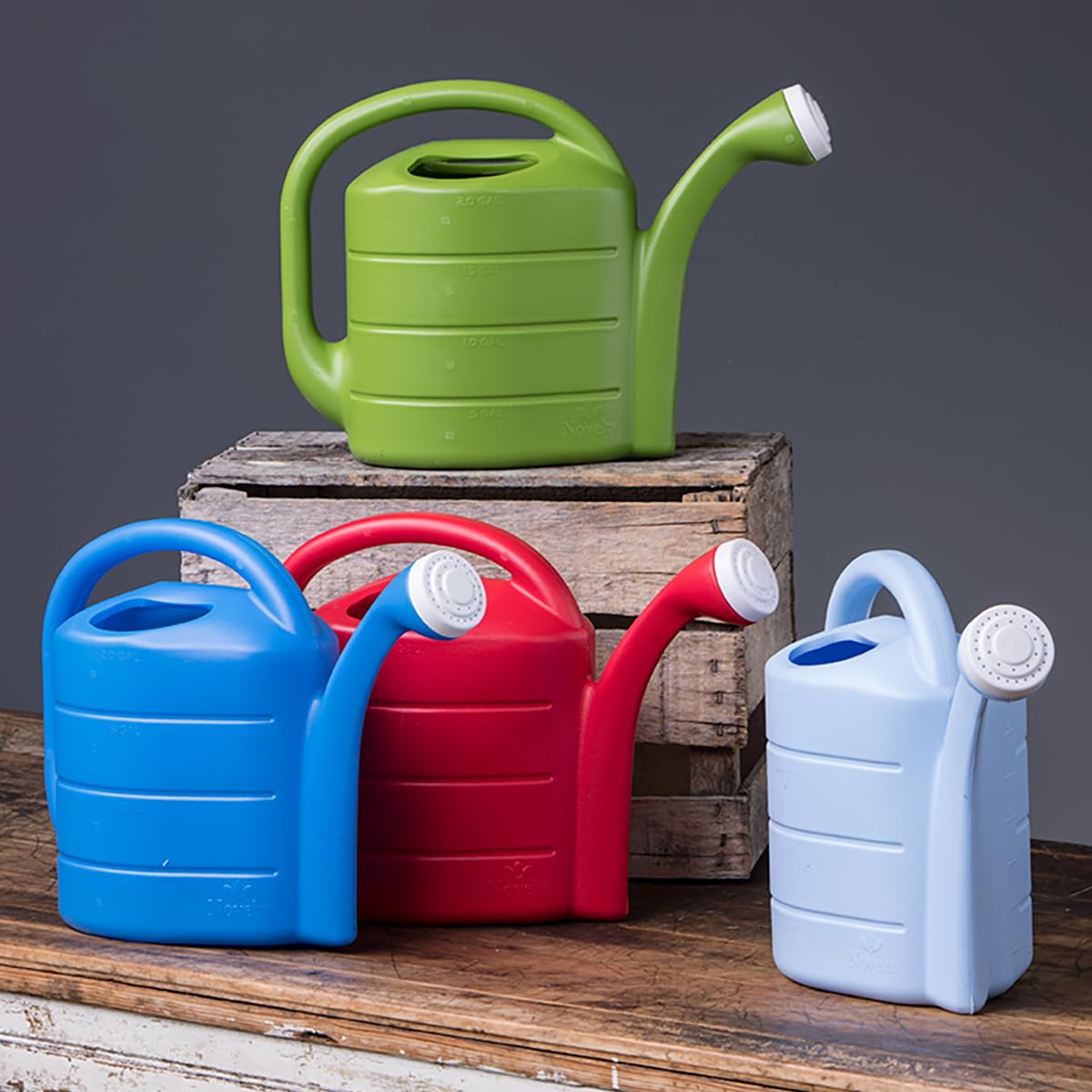 Novelty Root & Vessel 30411 red watering can with ergonomic handle and detachable nozzle for easy cleaning.