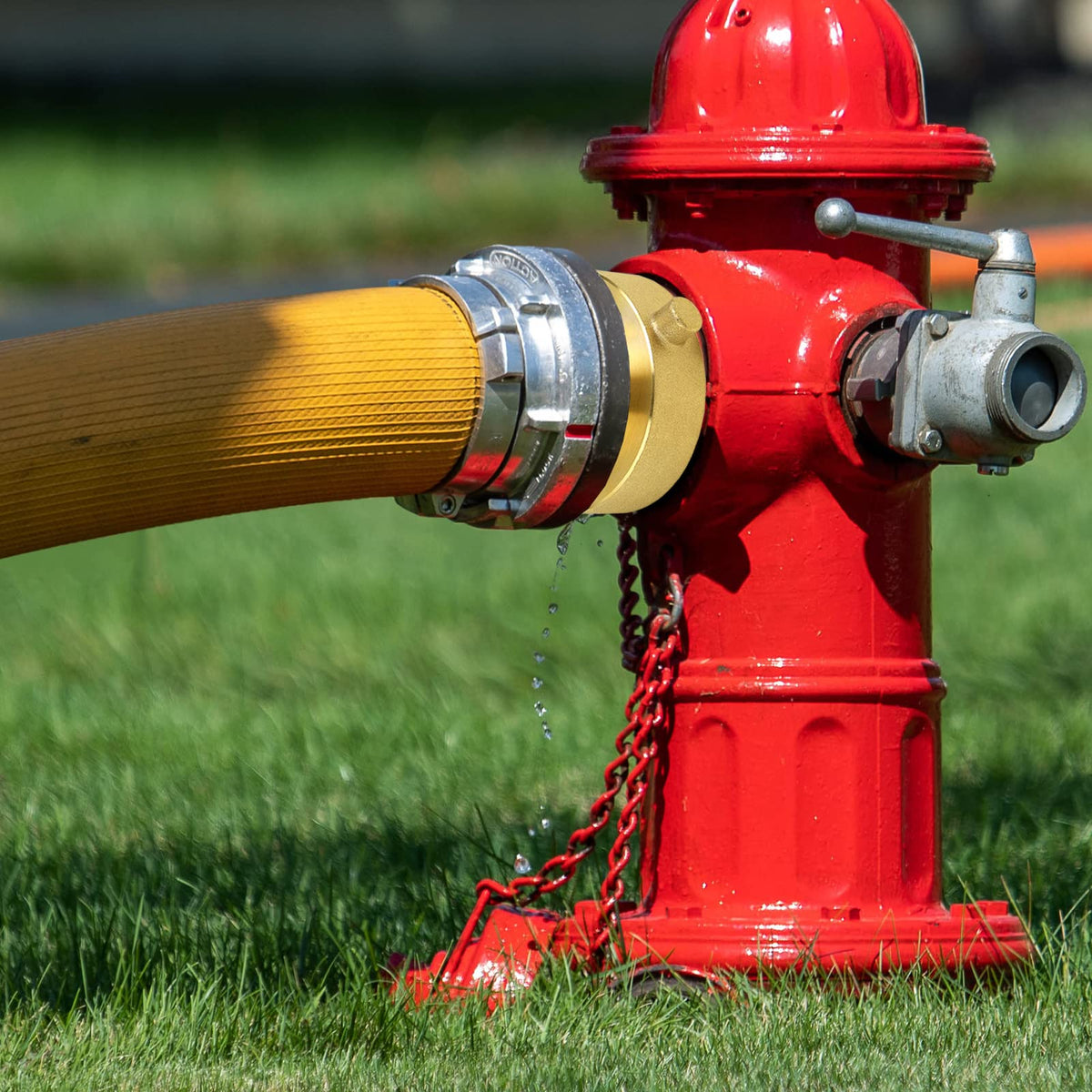 NOVINO hydrant adapter used in outdoor washing setup