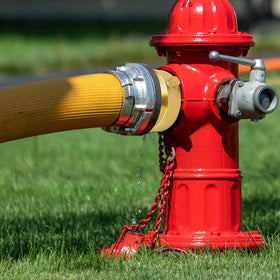 NOVINO hydrant adapter used in outdoor washing setup