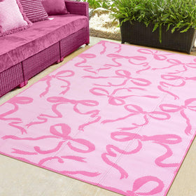 Nuanchu pink bow outdoor rug 5x8 ft provides barefoot comfort on patios