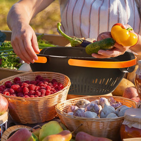Nuogo basket doubles as a colander for rinsing produce.