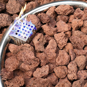 NUPICK red lava rocks for fire pits adding vibrant color and clean burn.