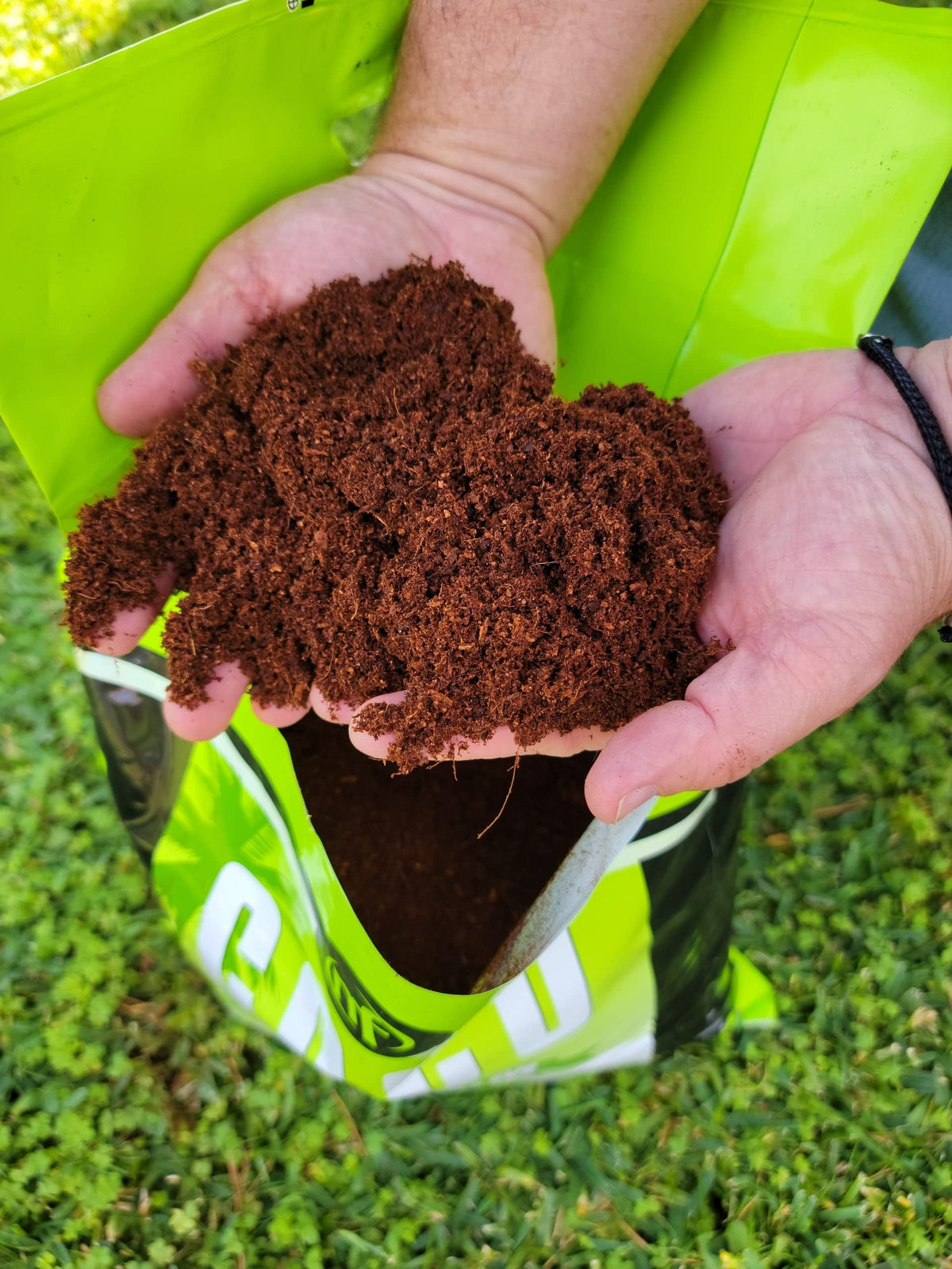 NUTRIFIELD Coco Coir being used to fill a planter quickly