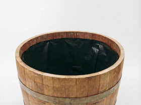 OAKENZ half-barrel liner interior showing 100-micron thickness for durable moisture protection.