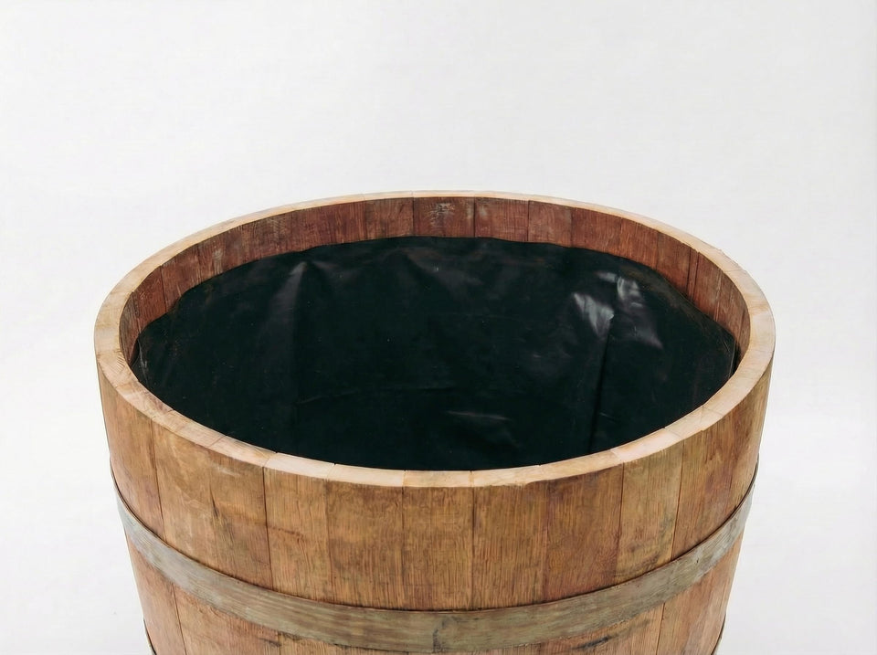 OAKENZ half-barrel liner interior showing 100-micron thickness for durable moisture protection.