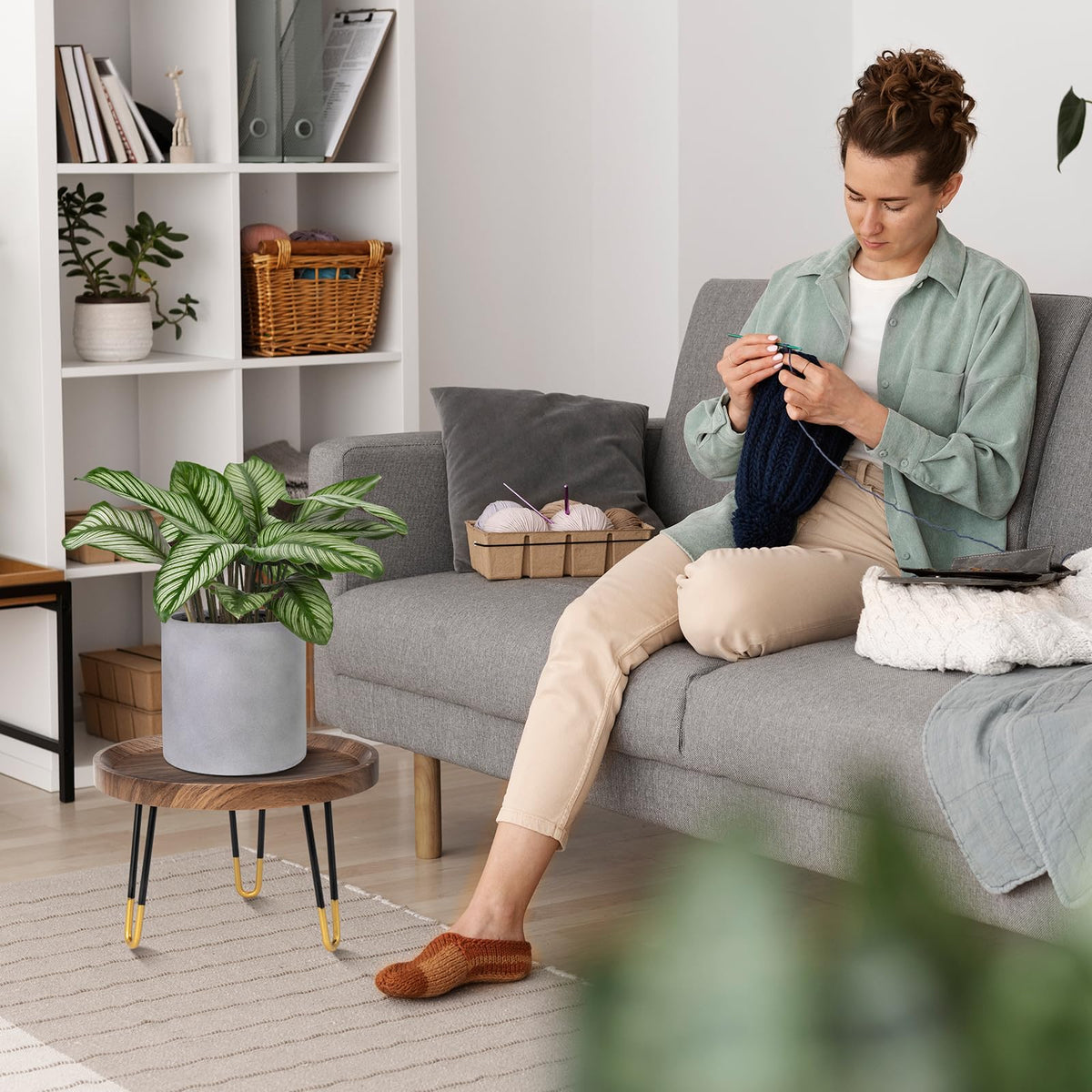 OBTAIN plant stand in mid-century style enhances room decor