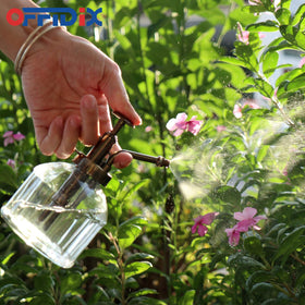 OFFIDIX decorative mister sits nicely on a plant stand or shelf.