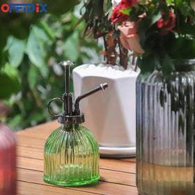 OFFIDIX Nordic-style plant sprayer adds chic decor to shelves.