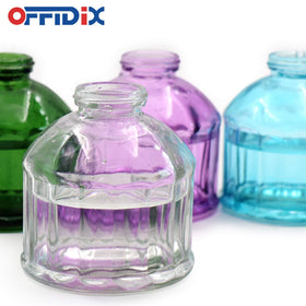 OFFIDIX small glass watering can suited for succulents and herbs.