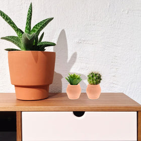 OFFSCH ornamental orange ceramic pot, decorative accent for shelves.