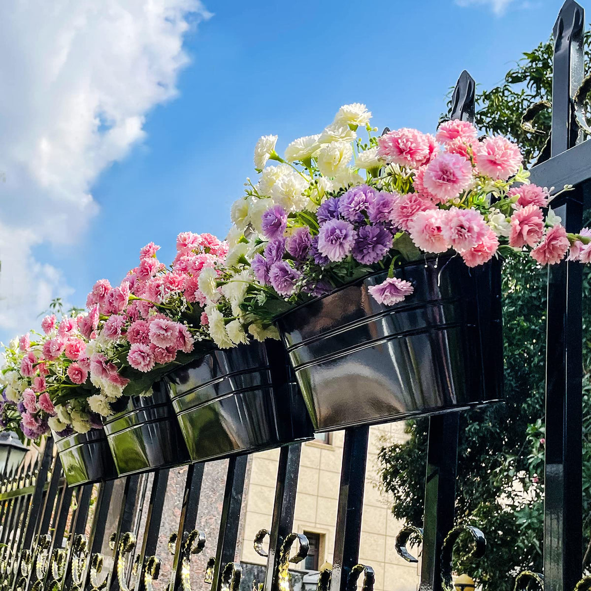 OGIMA rail-ready pots create lush vertical displays on fences