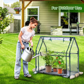 Ohuhu tabletop greenhouse with durable metal frame for long-term use outdoors.