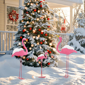 Ohuhu yard flamingos set up in garden for a playful family display