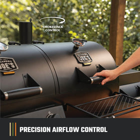 Oklahoma Joe's Canyon Combo firebox grate provides extra grilling space.