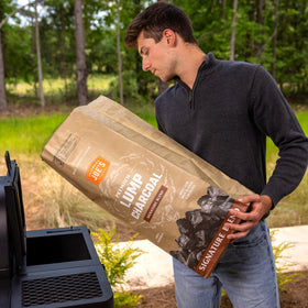 Oklahoma Joe's charcoal basket use enables even heat to master burgers.