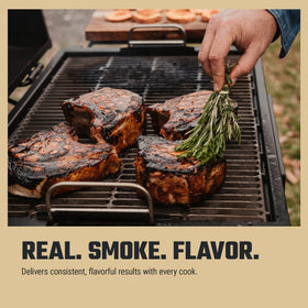 Oklahoma Joe's Hickory wood chunks close-up showing uniform size for steady smoke.