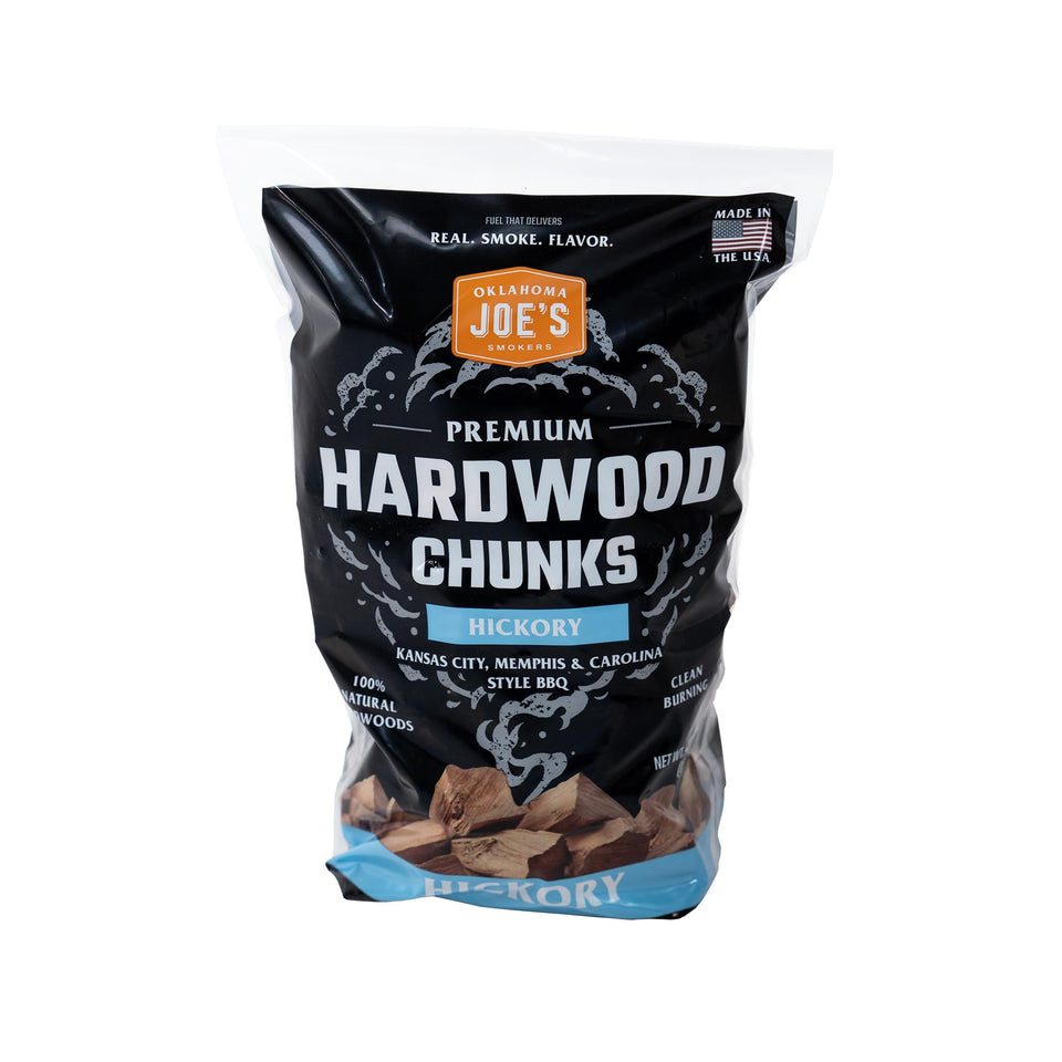 Oklahoma Joe's Hickory wood chunks top view in bag for even heating and smoky flavor.