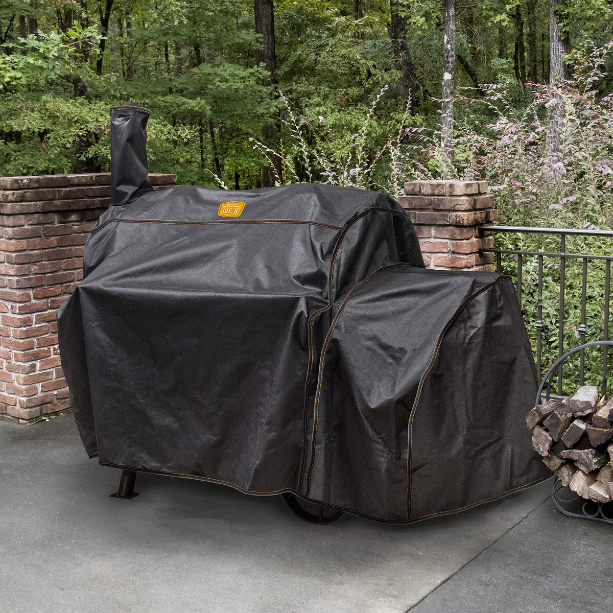 Oklahoma Joe’s Highland Offset Smoker Cover, back view, secure fit with hook-and-loop straps.