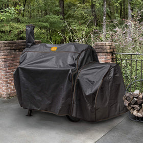 Oklahoma Joe’s Highland Offset Smoker Cover, back view, secure fit with hook-and-loop straps.