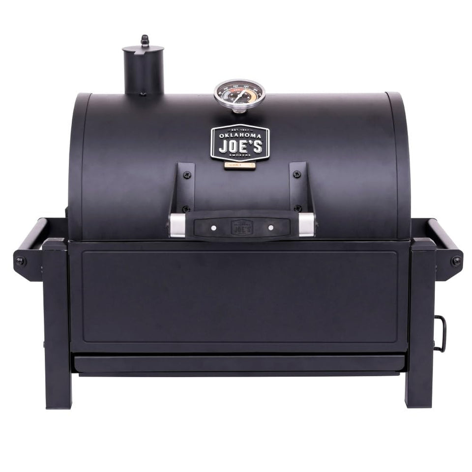 Oklahoma Joe's Rambler tabletop grill in compact setup for travel-ready cooking.