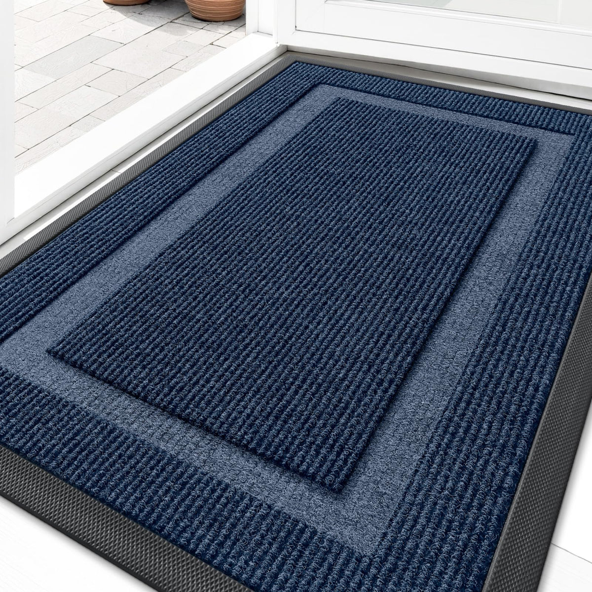 OLANLY front door mat blue closeup showing durable low-profile entry protection.