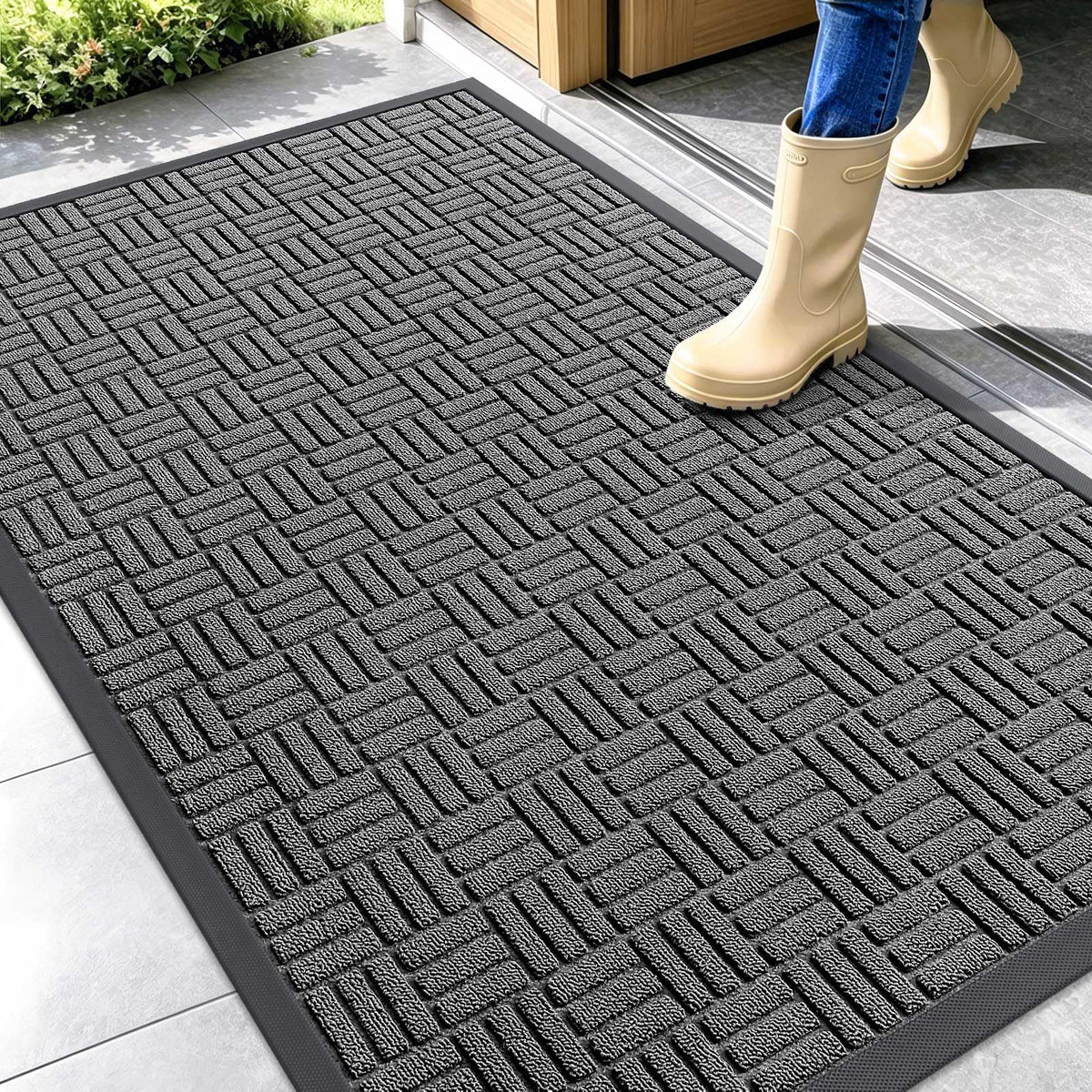 OLANLY front door mat with natural rubber backing for stable, floor protection.