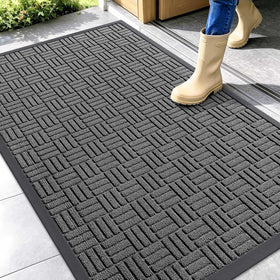 OLANLY front door mat with natural rubber backing for stable, floor protection.