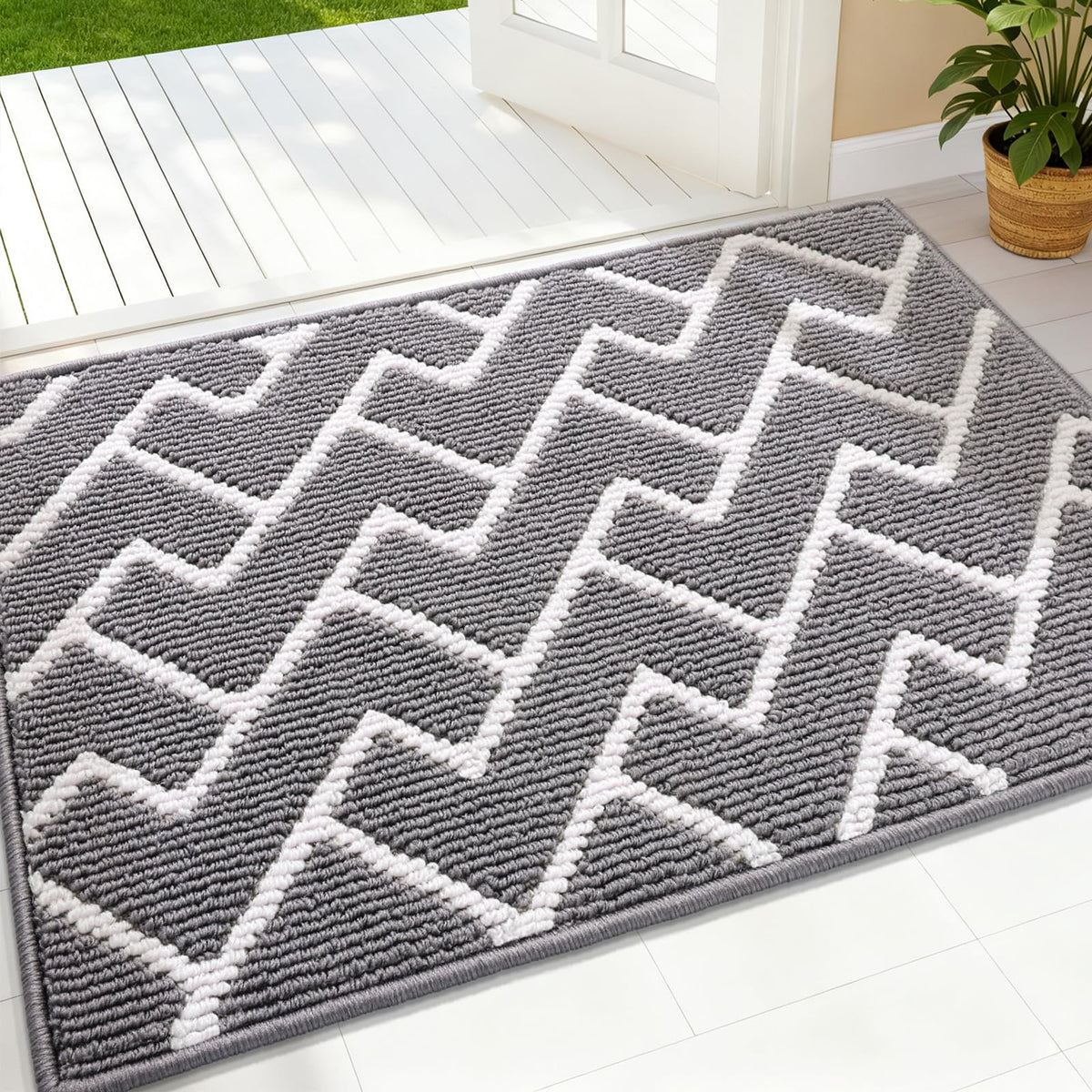 OLANLY front door mat with non-slip backing keeps entryways secure and clean.