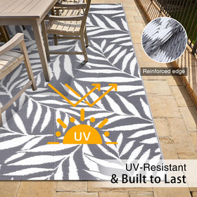 OLANLY patio rug on a sunny balcony; color remains vibrant and fade-resistant.