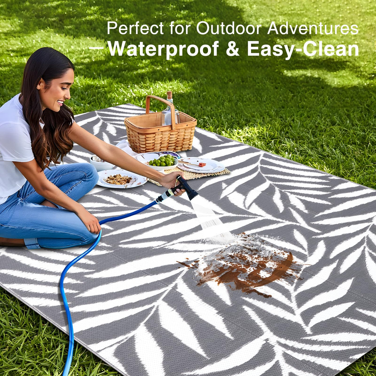 OLANLY rv mat for outdoor use on patios and campsites, easy to clean.