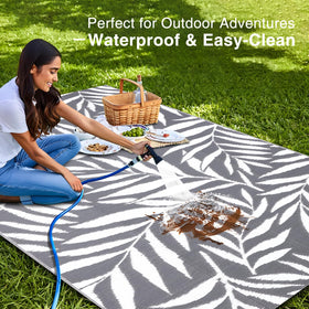 OLANLY rv mat for outdoor use on patios and campsites, easy to clean.