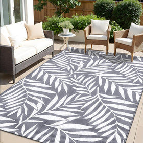OLANLY waterproof outdoor rug with grey-white leaf pattern, durable for patios and decks.