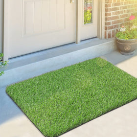 OLanto artificial grass door mat at the front entrance with non-slip bottom for safety