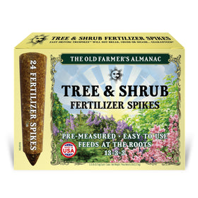 Old Farmer's Almanac TruSpikes inserted in soil near a tree for root feeding