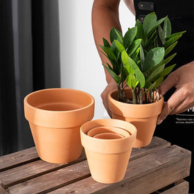 Breathable terracotta design promotes soil moisture balance in OLEEP pots.