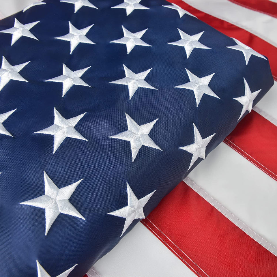Olycole 4x6 American Flag with embroidered stars for durable outdoor display.