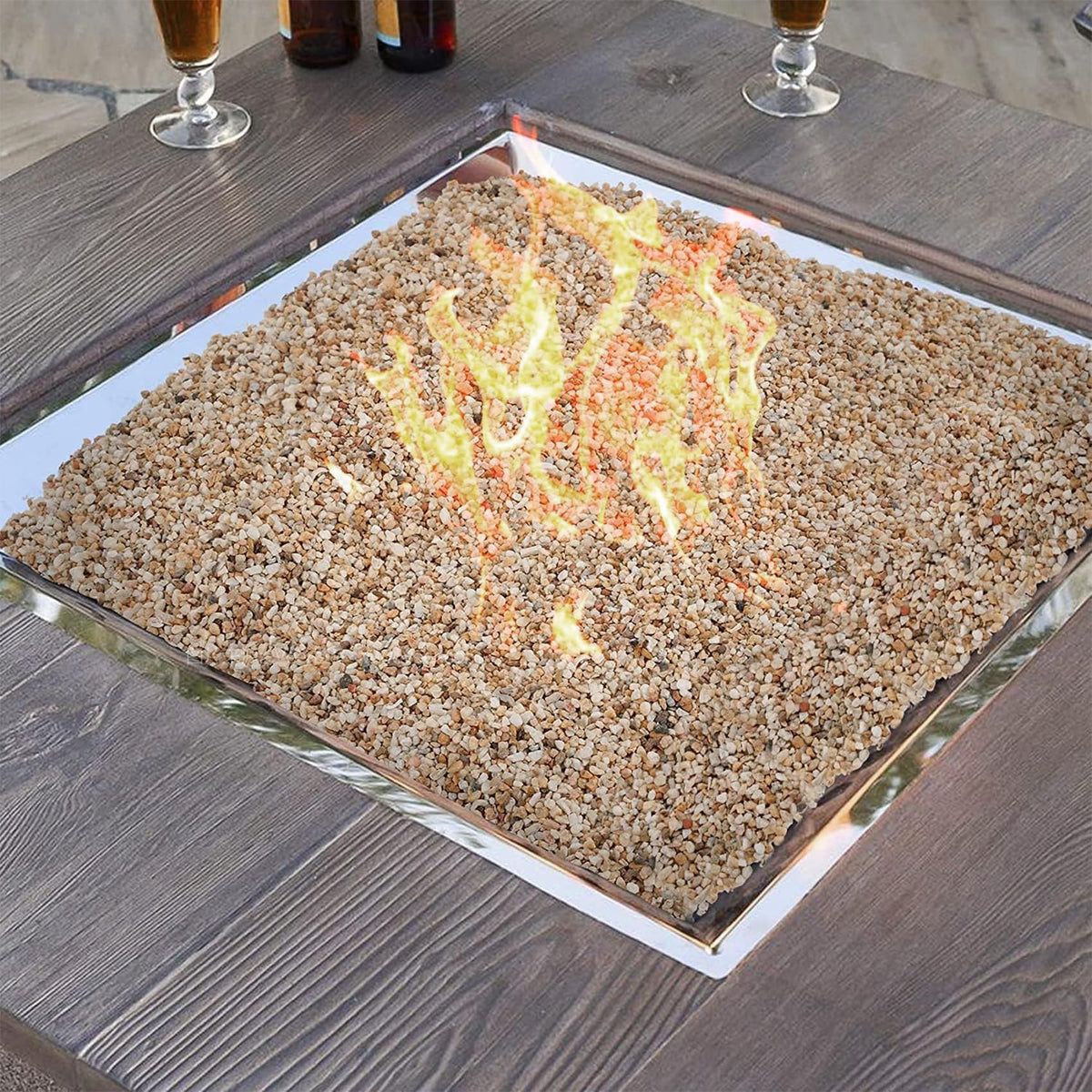 Onlyfire silica sand under lava rock creates a clean, even surface