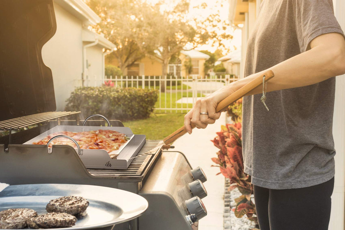 Onlyfire griddle in-use on a grill delivering steady searing with reduced flare-ups