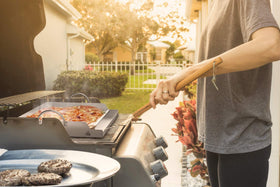 Onlyfire griddle in-use on a grill delivering steady searing with reduced flare-ups
