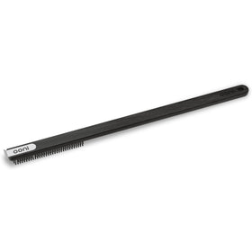 Ooni wire brush-scraper bristles close-up cleaning ash from a stone.