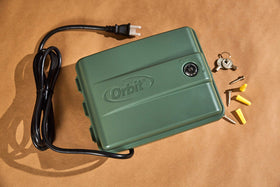 Orbit 4-Station Swing Panel Timer rain skip feature reduces watering waste.