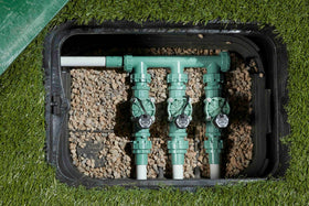 Orbit 57281 L-Series valve demonstrated with controllers for efficient irrigation management.