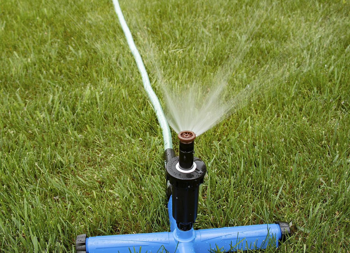 Orbit adjustable sprinkler head targets uneven lawns for even coverage and efficient watering.