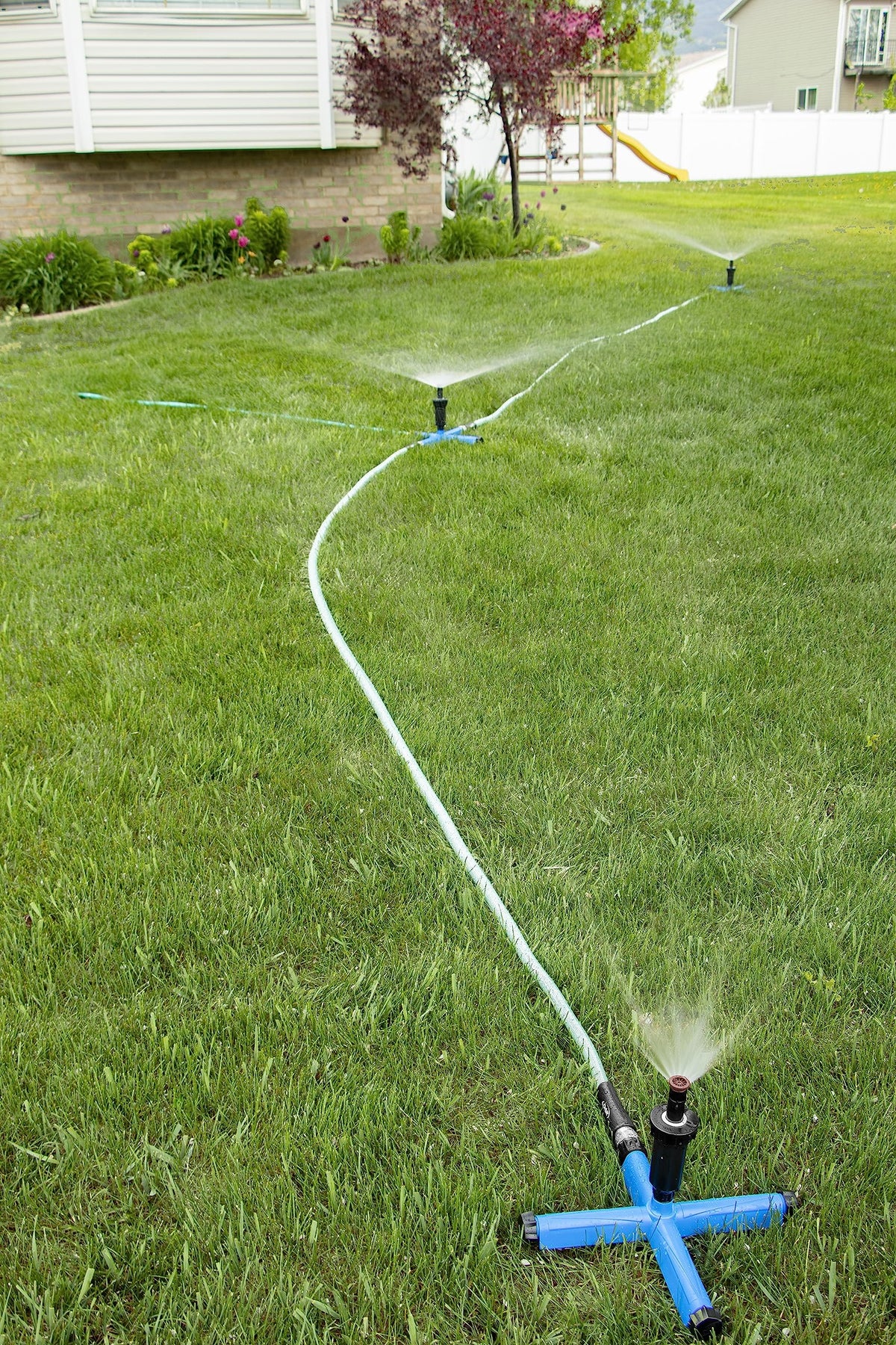 Orbit hose connection shows flow-through capability to water multiple zones.