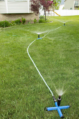 Orbit hose connection shows flow-through capability to water multiple zones.