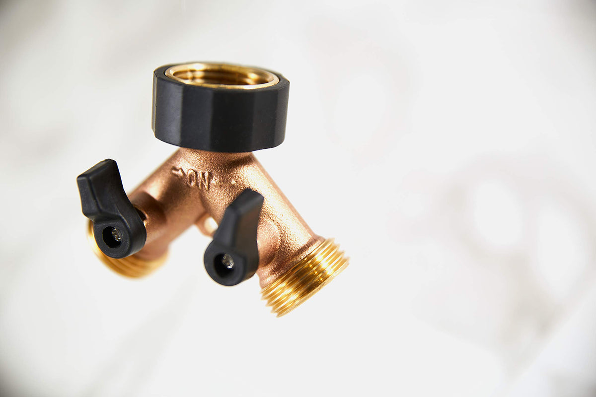 Orbit brass adapter attached to standard 3/4-inch thread on faucet.