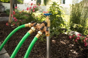 Orbit four-outlet brass manifold with shut-off valves for precise water control